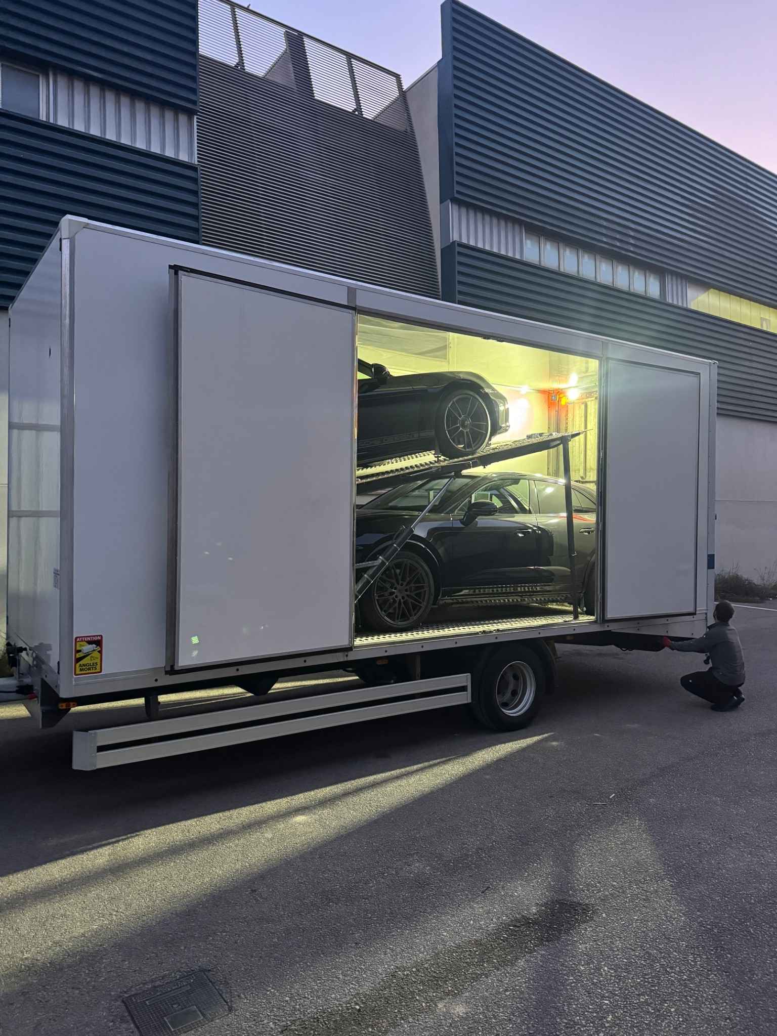 Safe vehicle transfer on transporter